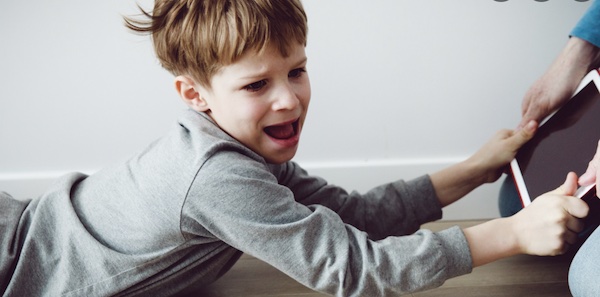 A  child addicted to video games may be violent and aggresive.